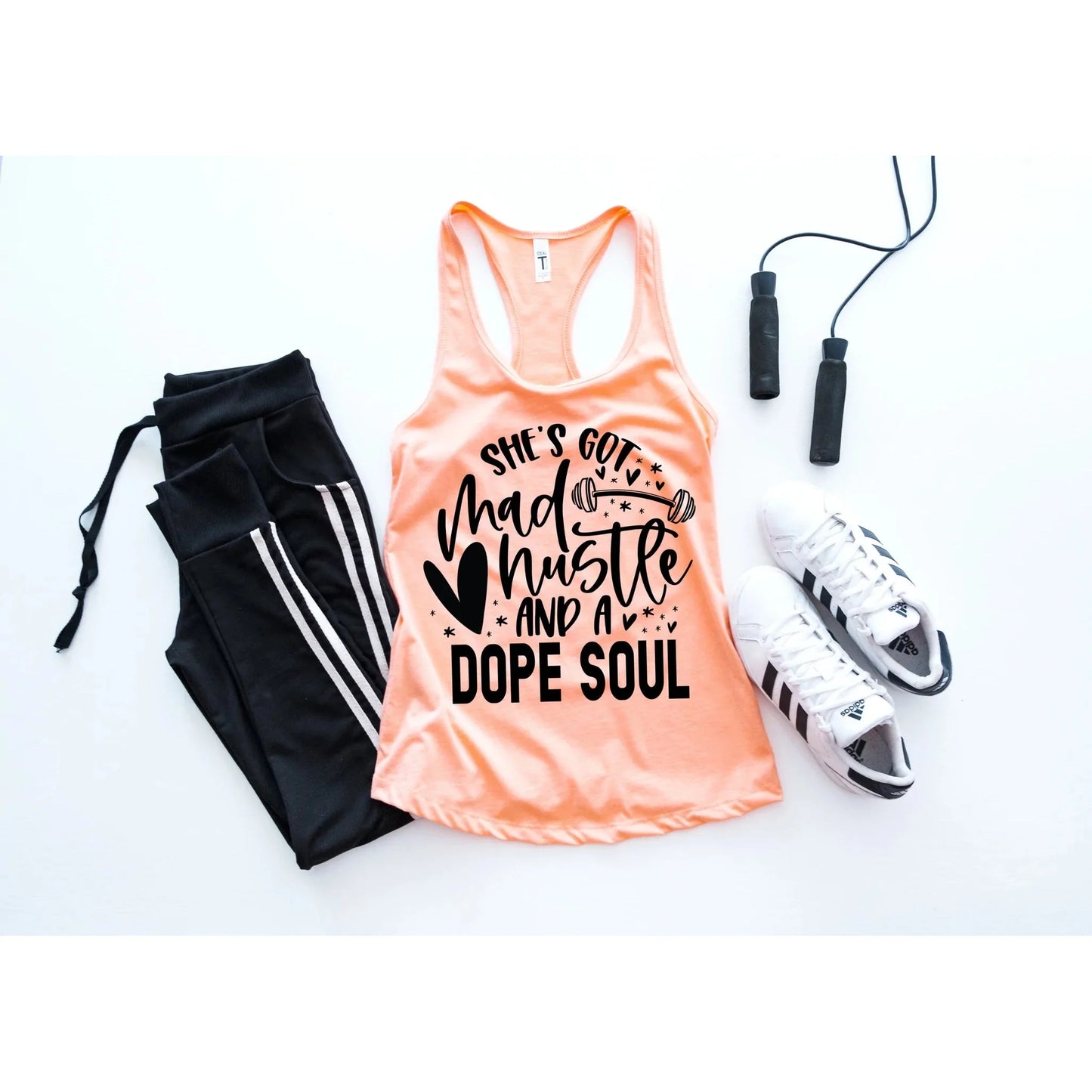 She's got mad hustle and a dope soul Tank