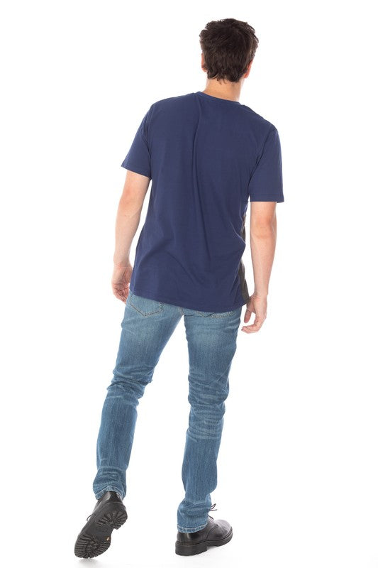 DISTRESSED SLIM TAPER DENIM JEANS