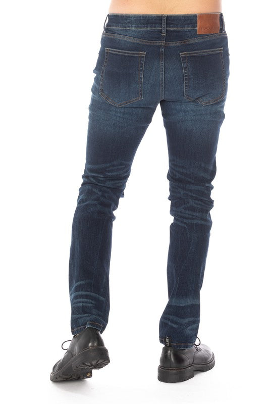 DISTRESSED SLIM TAPER DENIM JEANS