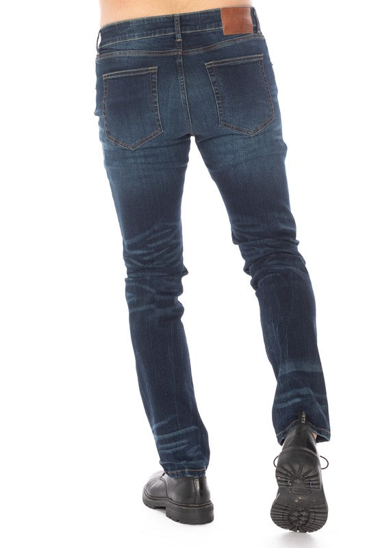 DISTRESSED SLIM TAPER DENIM JEANS