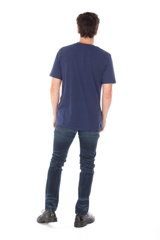 DISTRESSED SLIM TAPER DENIM JEANS